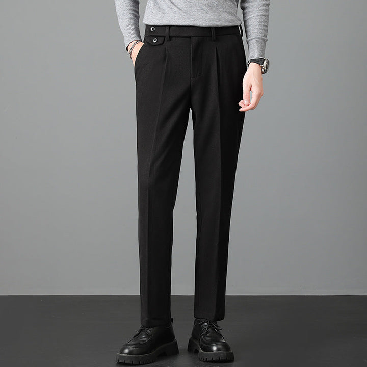 Close-up of men's slim fit dress pants fabric, showcasing quality tailoring and smooth texture for professional attire.
