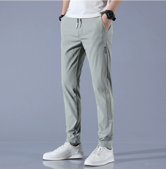 Men's slim fit gray jogger pants with drawstring waist for ultimate comfort, casual wear & streetwear style.