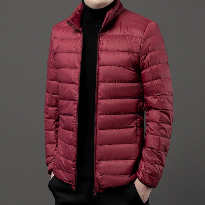 Men's casual slim-fit puffer jacket. Lightweight quilted outerwear, great for fall, winter & everyday style.