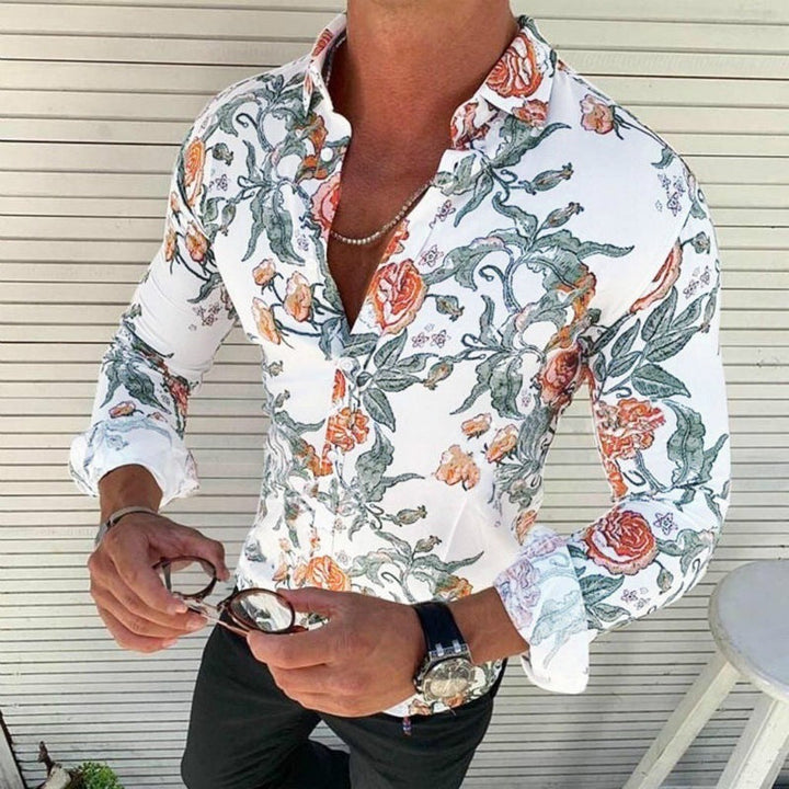 Stylish man in a floral print party shirt with long sleeves, ideal for modern fashion events.