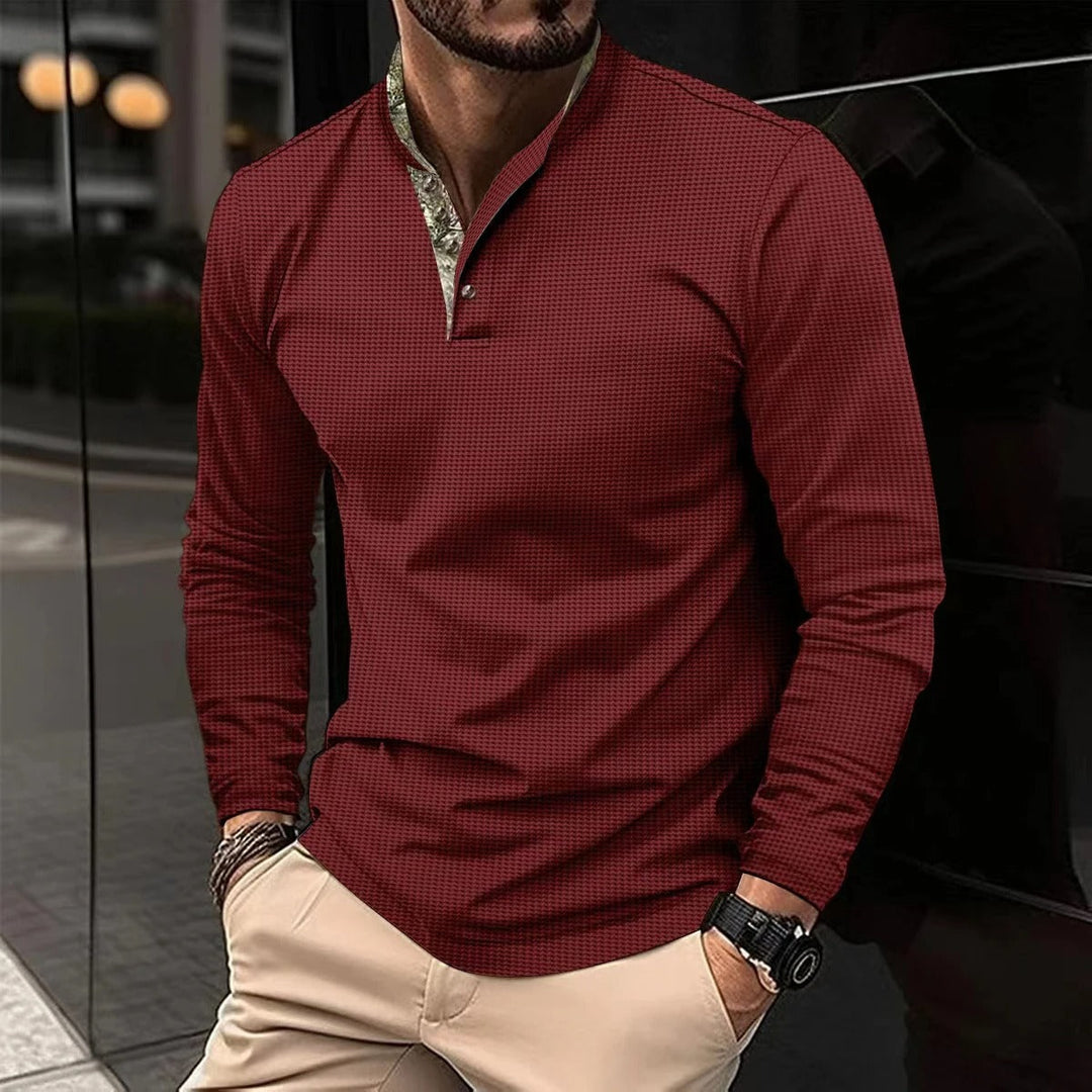Stylish men's slim-fit long sleeve Henley shirt featuring a mandarin collar, ideal for casual wear.