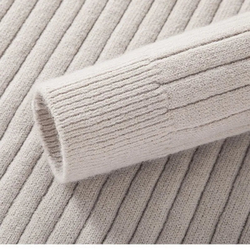 Modern men's slim fit quarter zip sweater with a stand collar, offering stylish comfort for any occasion.