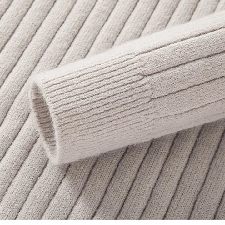 Modern men's slim fit quarter zip sweater with a stand collar, offering stylish comfort for any occasion.