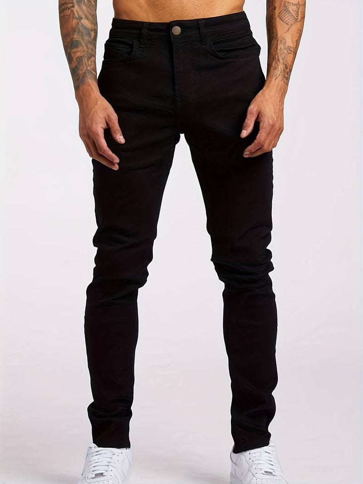 Comfortable men's slim fit jeans. Essential five-pocket streetwear style, great for casual and modern fashion.
