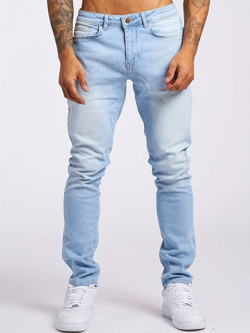 Sleek men's slim fit jeans. Classic five-pocket design, ideal for streetwear and modern casual men's fashion.