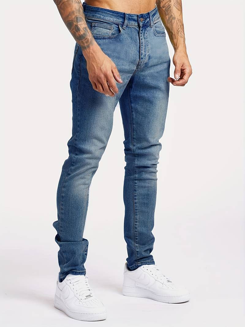 Classic five-pocket men's slim fit jeans. Modern streetwear staple for comfortable everyday casual fashion.