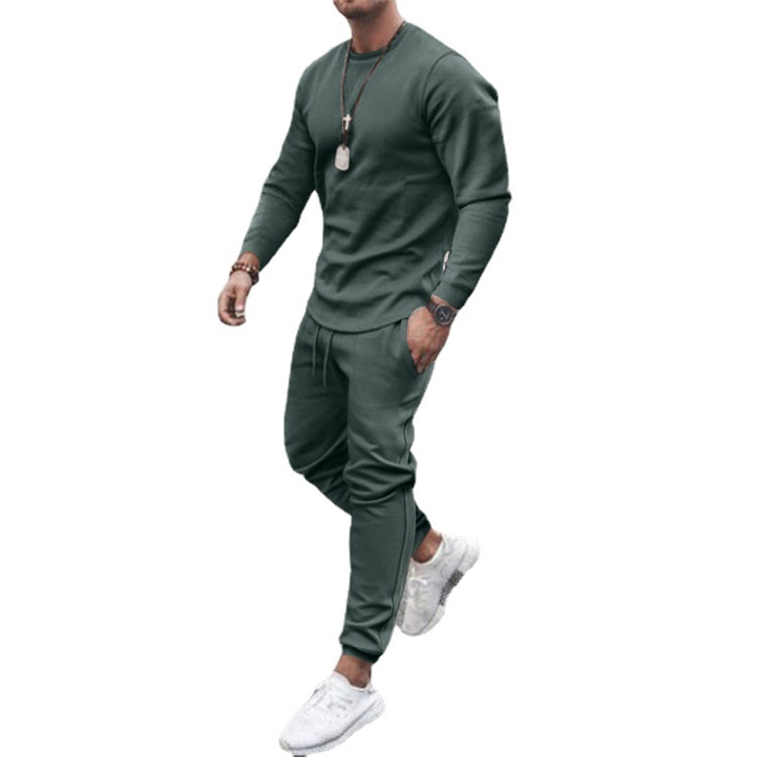Stylish men's slim fit jogging suit, ideal for casual wear, loungewear, or athletic activities.