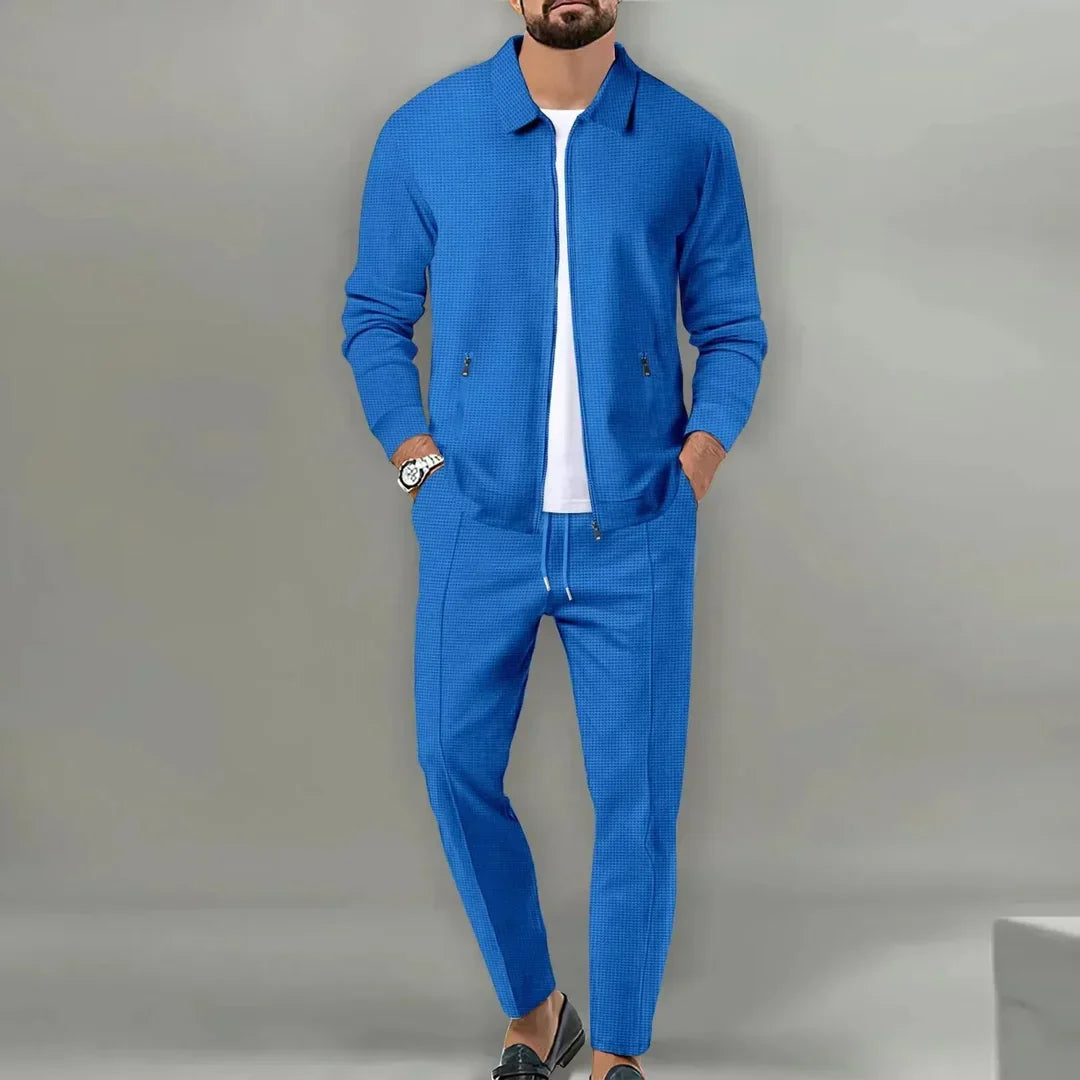 Sophisticated men's slim fit business suit for the modern professional, featuring a tailored blazer & trousers.
