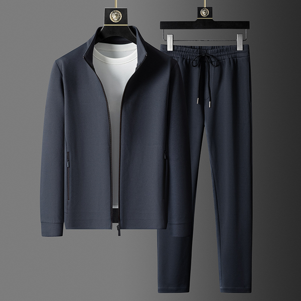 Men's slim fit two-piece tracksuit for training & casual wear. Comfortable athletic joggers & jacket.
