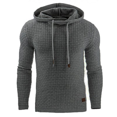 Textured men's slim fit hoodie in a cozy fabric, offering stylish comfort for winter casual fashion.