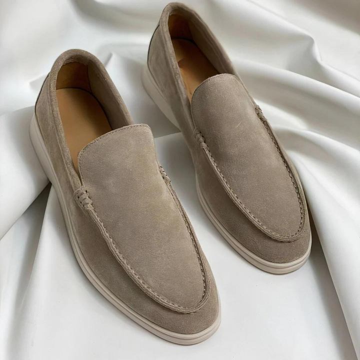 Lifestyle shot: Man wearing stylish men's casual slip-on loafers for effortless everyday style.