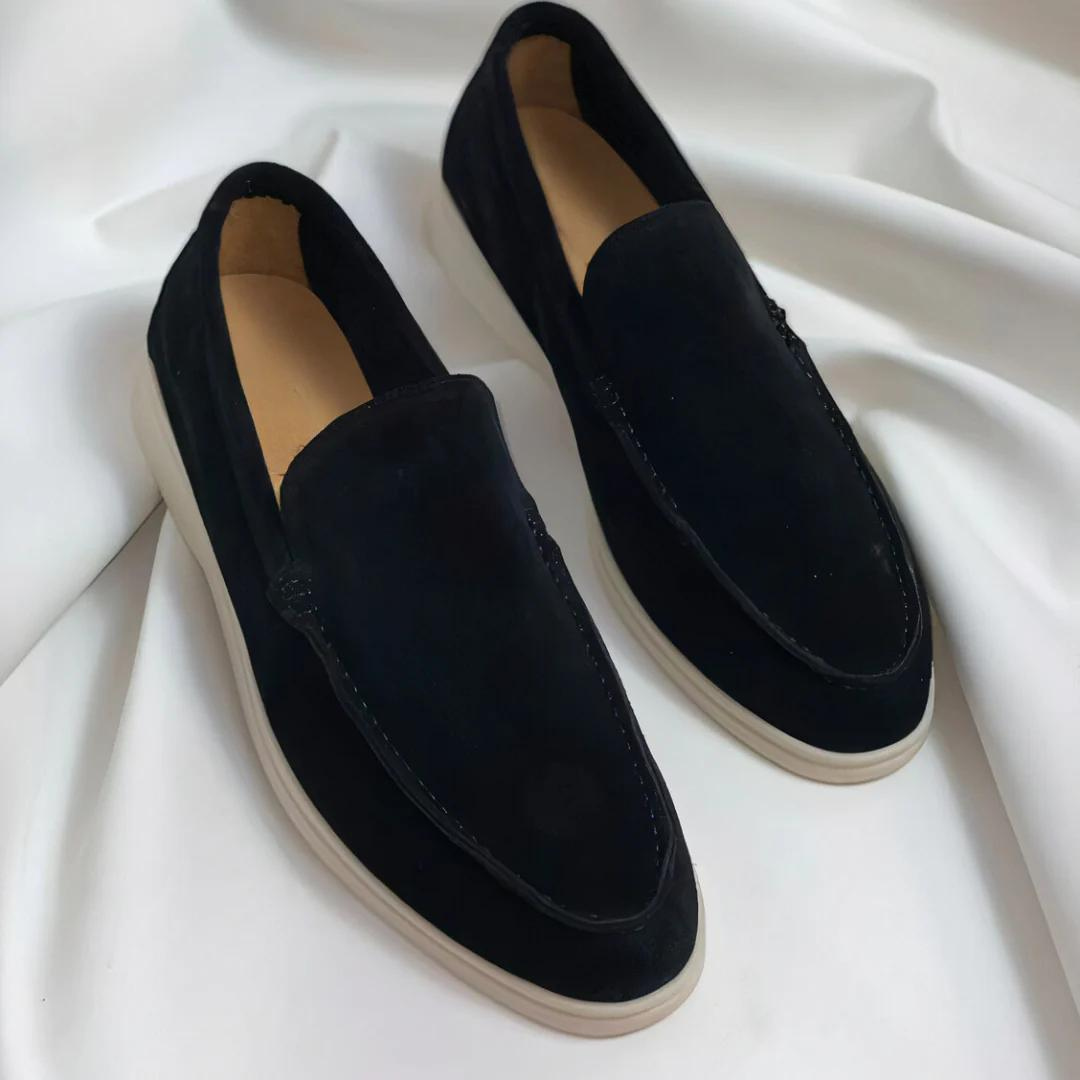Back view of men's easy wear slip-on loafers, emphasizing their comfortable and casual design.