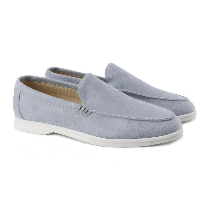 Side view of men's minimalist slip-on loafers, showcasing their versatile and easy-wear design.
