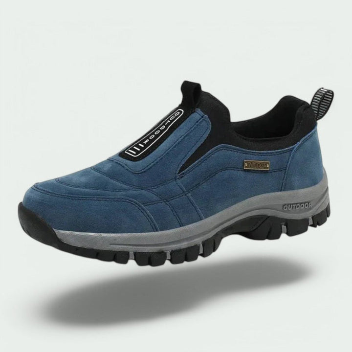 Comfortable men's slip-on trainers with cushioned support for walking & outdoor activities. Non-slip sole.