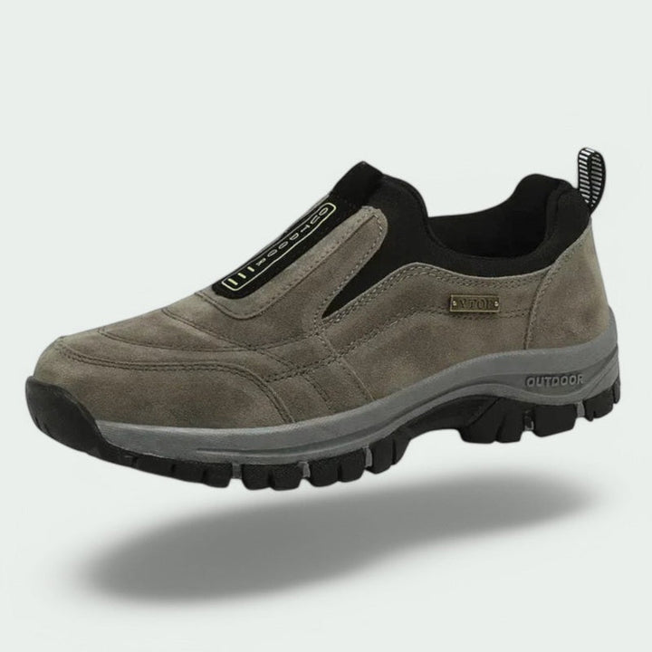 Back view of men's slip-on shoes, designed for ultimate comfort, cushioned support & easy wear for walking.