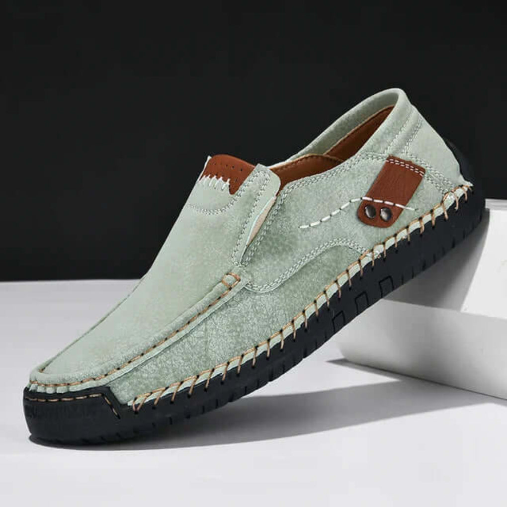 White men's orthopedic slip-on shoes, offering arch support for comfortable daily wear and easy on/off.