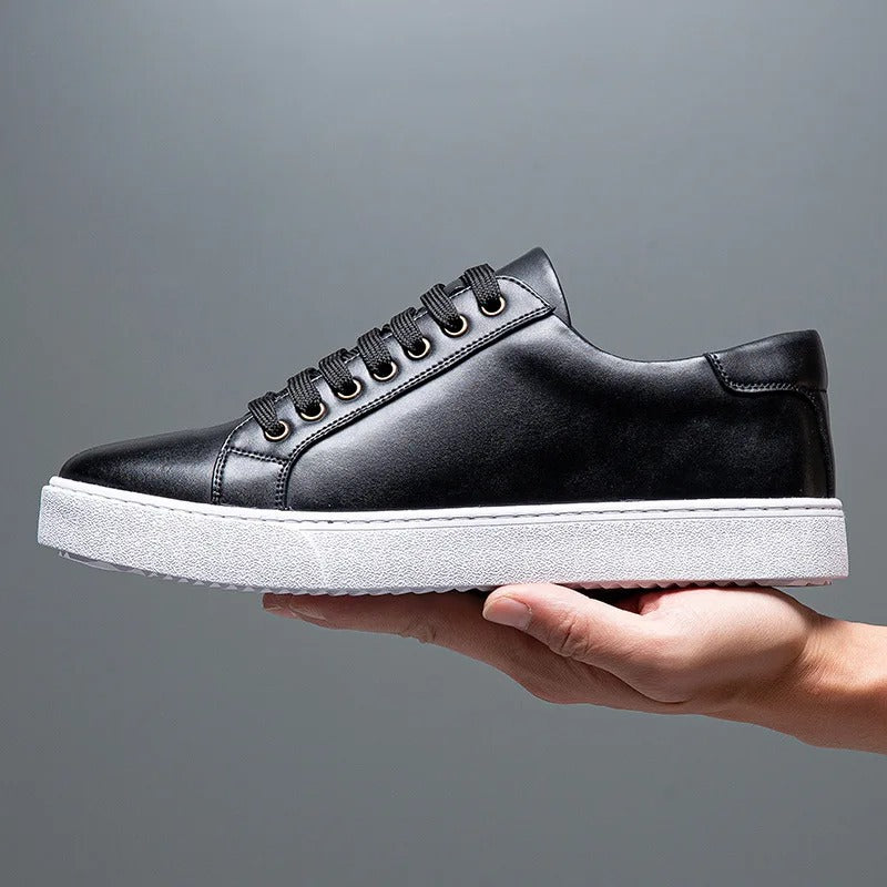 Men's smart casual black lace-up trainers. Sleek low-top sneakers, versatile for everyday style.