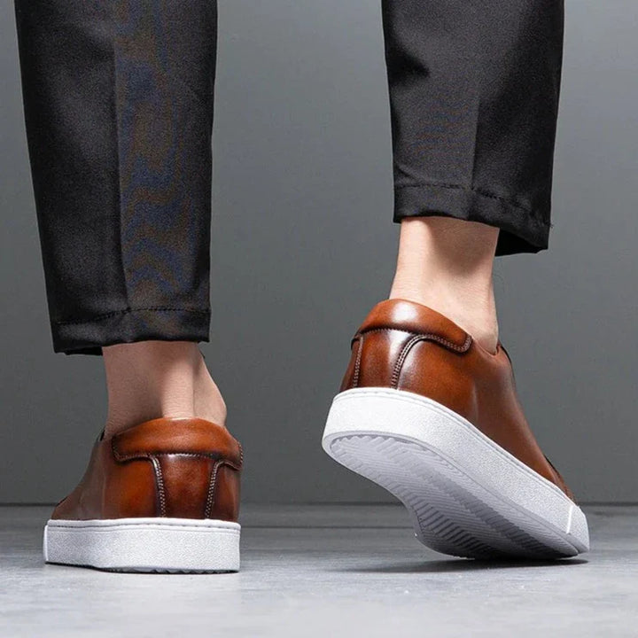 Men's sleek smart casual trainers. Lace-up low-top sneakers offering versatile everyday style.