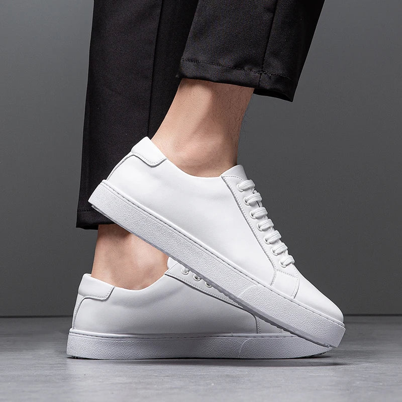 Men's smart casual white lace-up trainers. Sleek low-top sneakers for a fresh, versatile style.