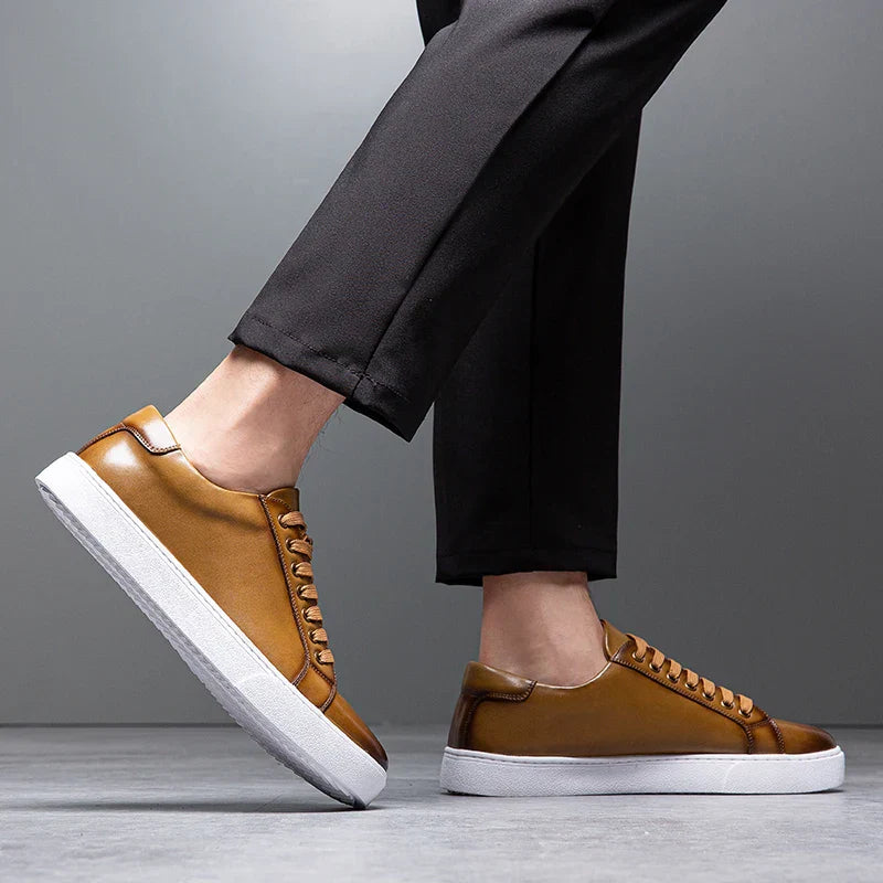 Men's modern smart casual low-top trainers. Sleek lace-up sneakers for versatile daily wear.
