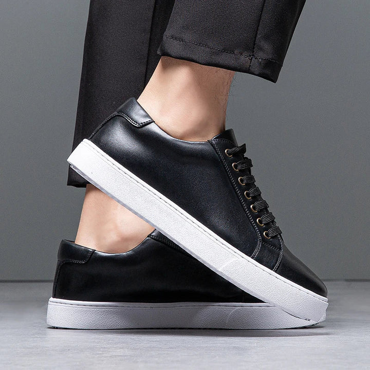 Sleek men's smart casual sneakers. Low-top lace-up trainers for a modern, versatile look.