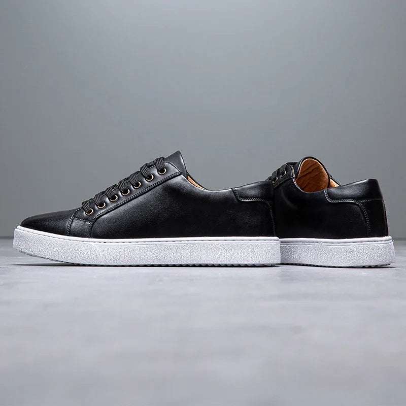 Everyday men's black lace-up trainers. Comfortable smart casual low-top sneakers for versatile style.