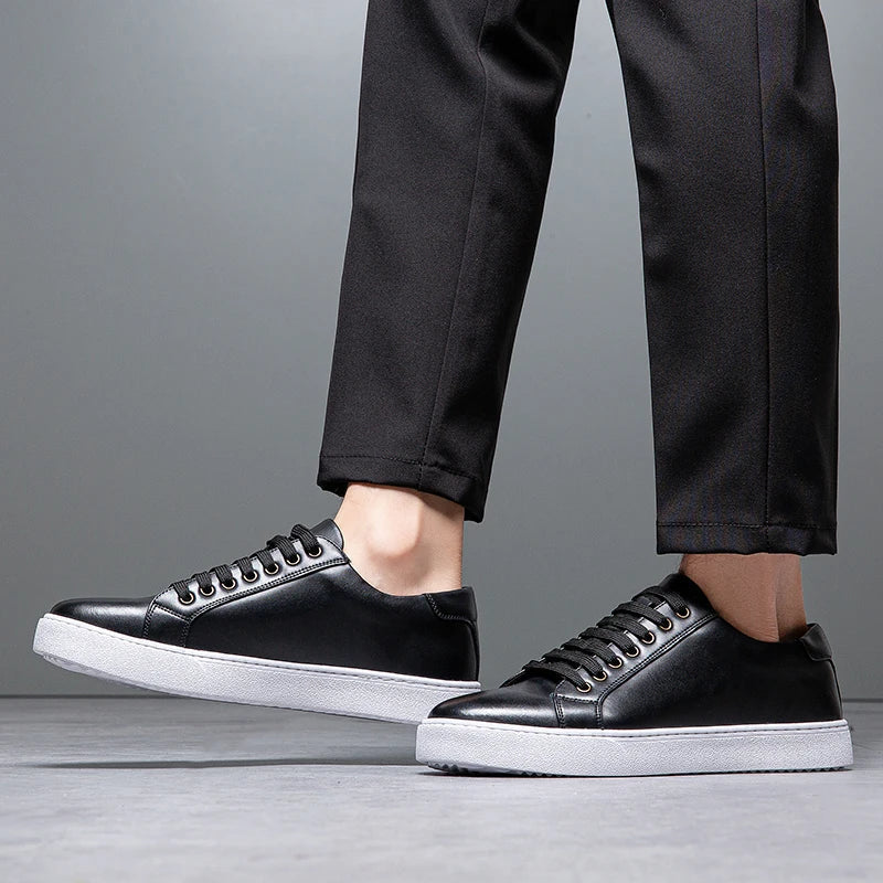 Modern men's smart casual low-top trainers. Sleek lace-up sneakers for versatile use.