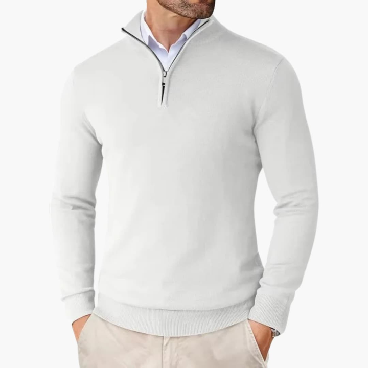 Men's long sleeve quarter zip pullover knit top featuring a stylish ribbed hem. Ideal for layering.