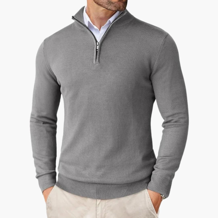 Men's stylish quarter zip knit top, a versatile long sleeve pullover with a contemporary ribbed hem.