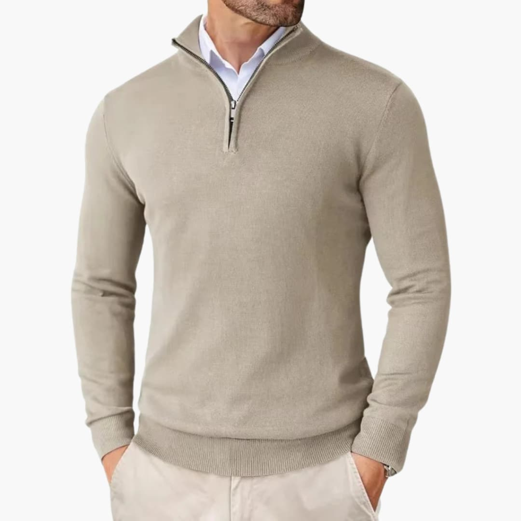 Men's comfortable quarter zip pullover knit top. Smart casual long sleeve design with ribbed hem.