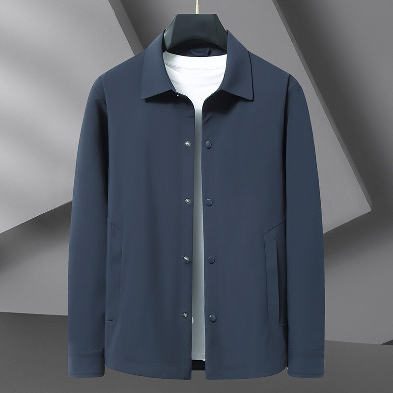 Men's snap front shirt jacket for casual wear. Versatile collared outerwear perfect for layering in spring or fall.