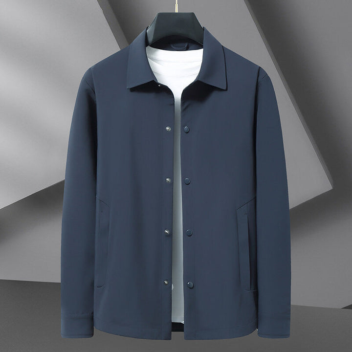 Men's snap front shirt jacket for casual wear. Versatile collared outerwear perfect for layering in spring or fall.