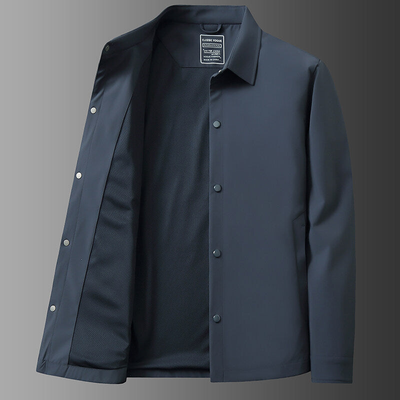 Stylish men's snap front shirt jacket, ideal for everyday casual wear. Comfortable spring & fall layering piece.