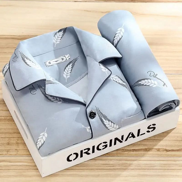 Close-up of the soft, breathable fabric of men's button-up pajama set, ensuring ultimate comfort & relaxation.