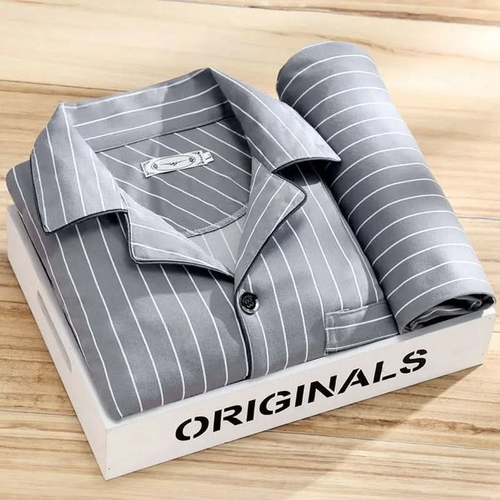 Men's soft, breathable button-up pajama set, beautifully packaged, an excellent comfort gift for him.