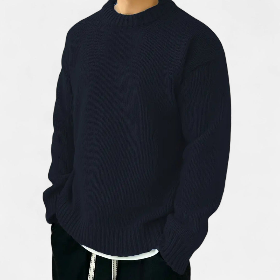 Classic men's solid crew neck pullover sweater, offering a comfortable fit for fall and winter style.