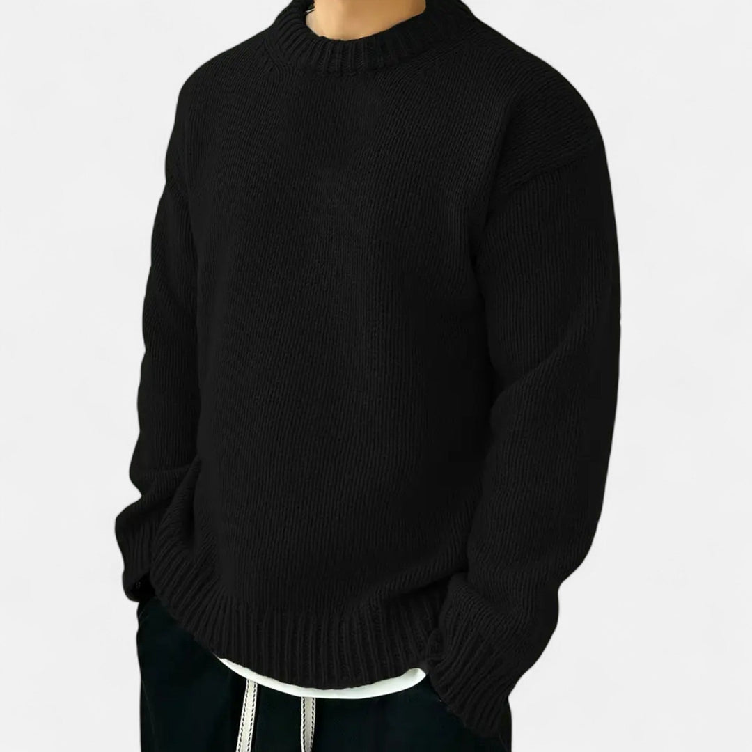 Men's warm solid crew neck pullover sweater, excellent for layering during colder fall and winter months.