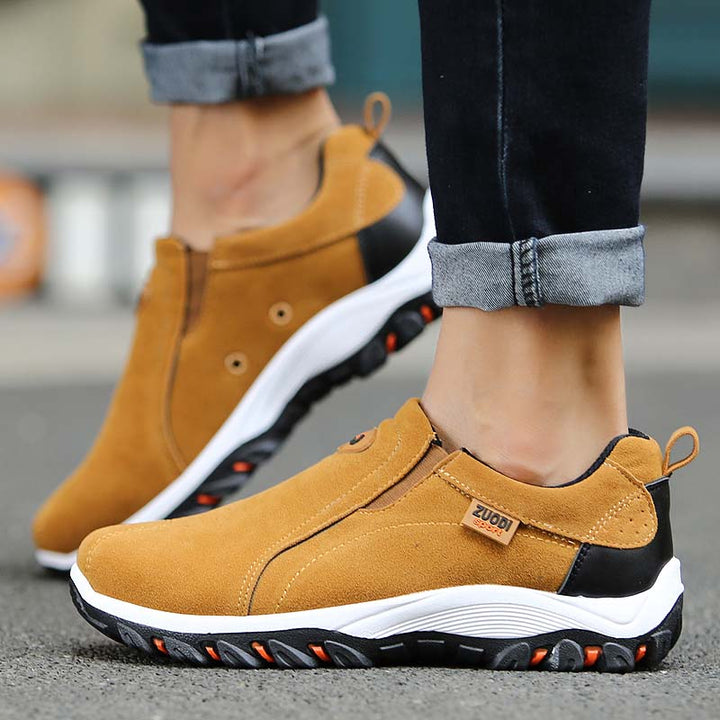 Modern men's slip-on casual sneakers, offering lightweight comfort & sporty style for versatile daily use.