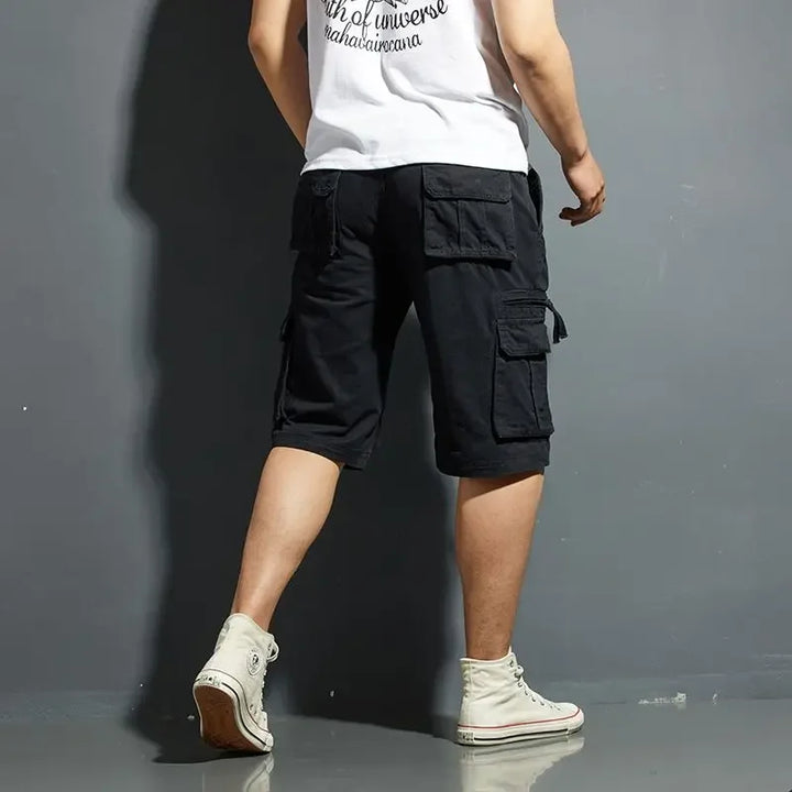 Back view: Men's casual spring cargo shorts with large rear utility pockets, offering relaxed fit & practical storage for daily use.