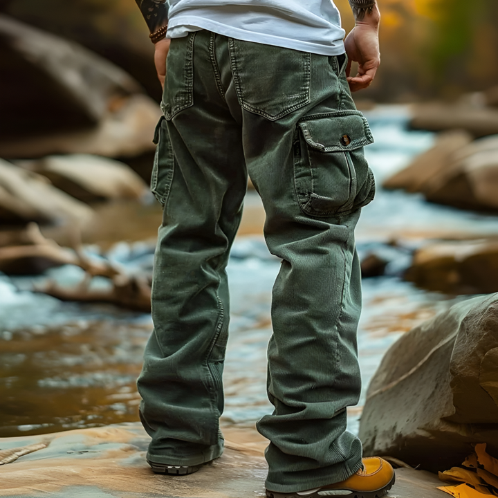 Close-up of men's ribbed straight leg trousers, highlighting modern fashion & comfortable fabric for smart casual looks.