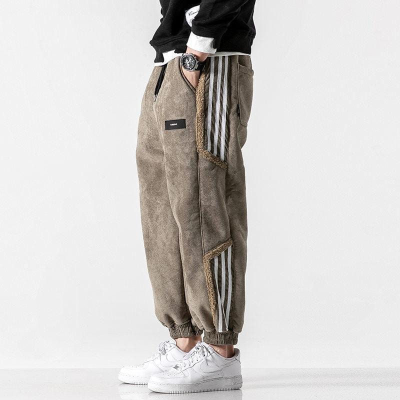 Brown men's streetwear joggers, offering a comfortable relaxed fit for everyday casual wear
