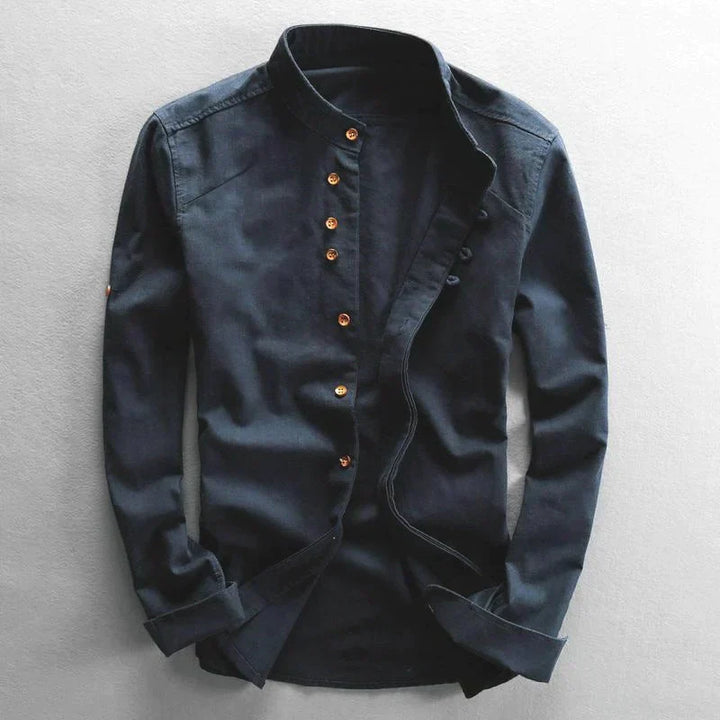 Men's stylish band collar button-down shirt. Long sleeve, versatile for modern casual fashion.