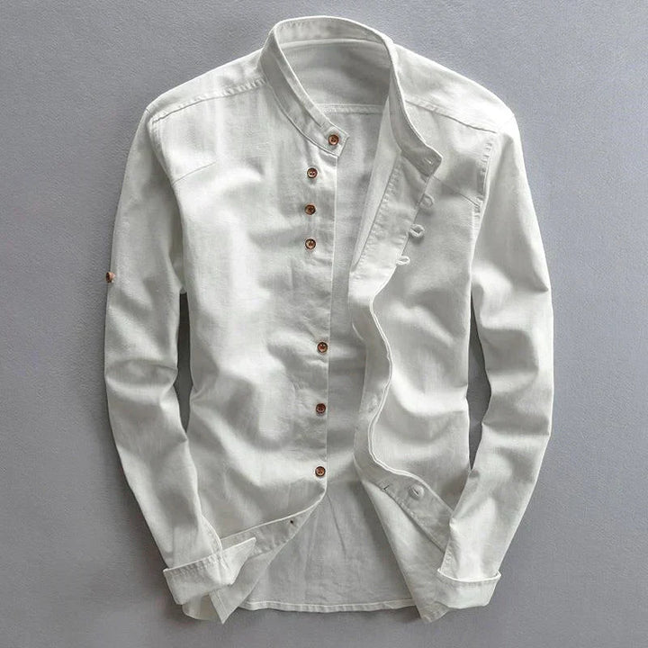 Casual men's band collar button-down shirt with roll-tab sleeves. Modern, stylish, versatile men's apparel.