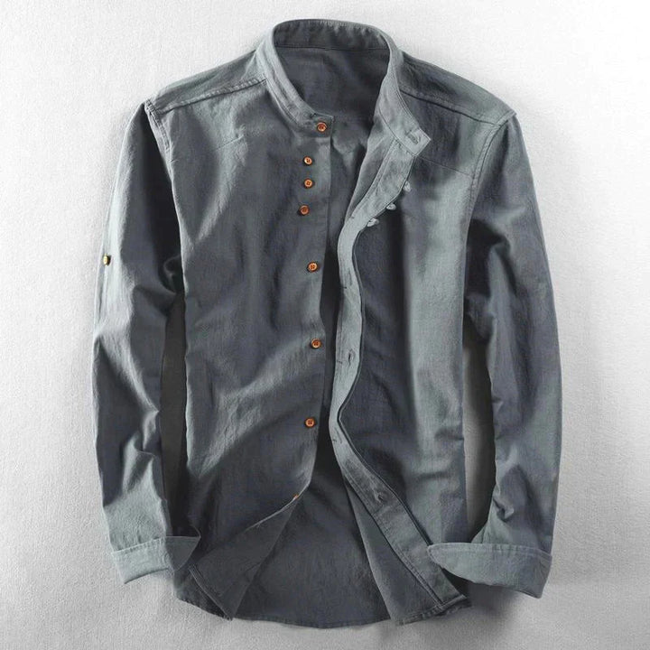 Men's contemporary band collar button-down shirt. Long sleeve, roll tab, perfect for versatile casual wear.