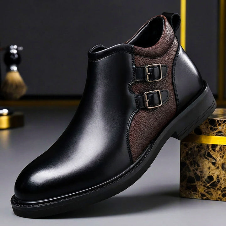 Elegant men's leather ankle boots featuring unique double buckle straps, ideal for modern dress and casual fashion.