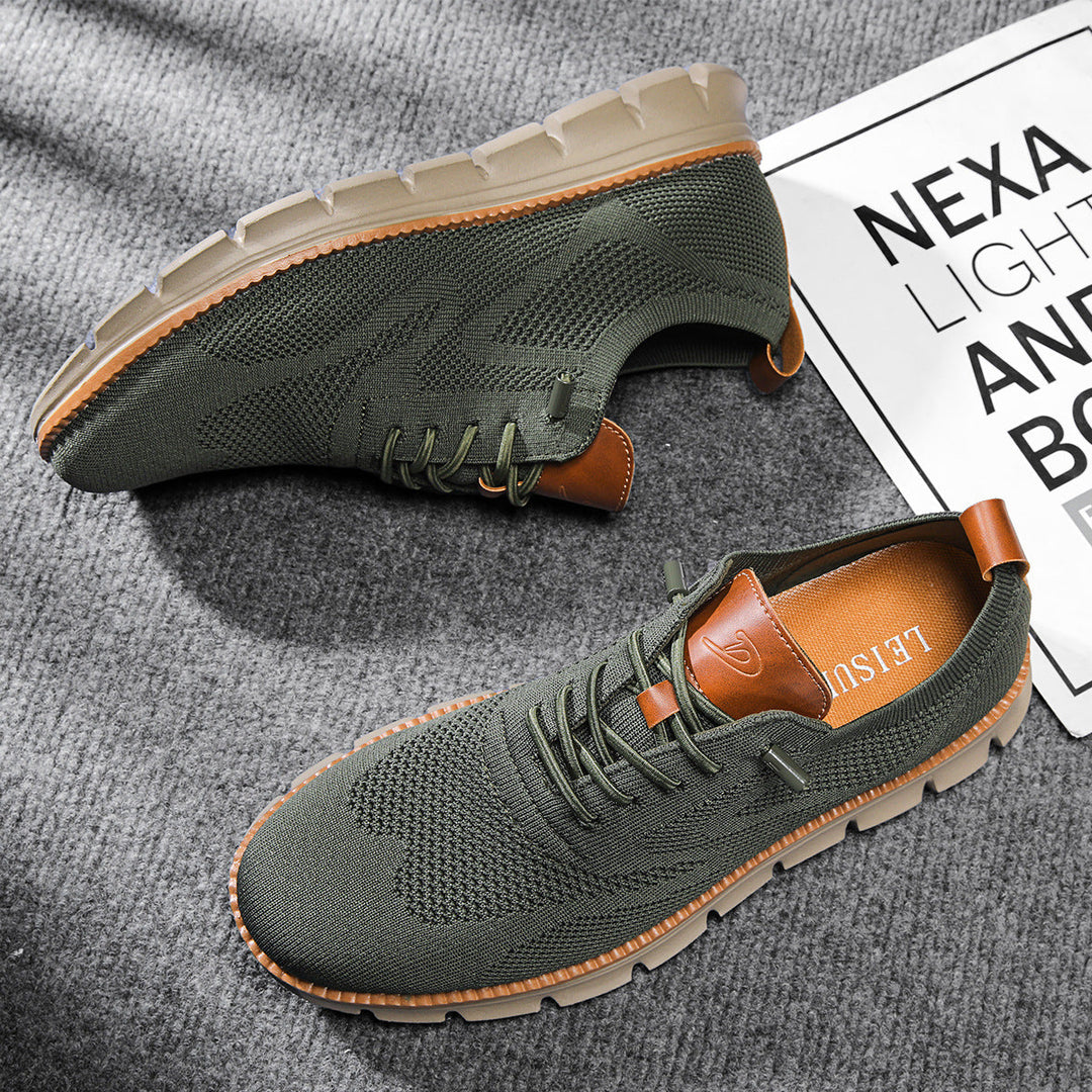 Men's breathable perforated lace-up sneakers, stylish & comfortable for versatile everyday wear.