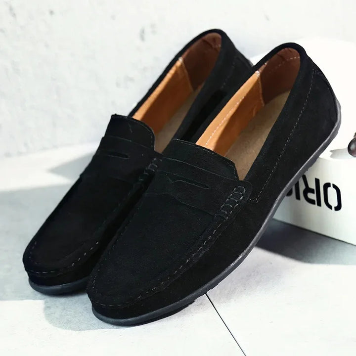 Men's stylish brown leather loafers, perfect for everyday comfort & versatile fashion. Slip-on design.