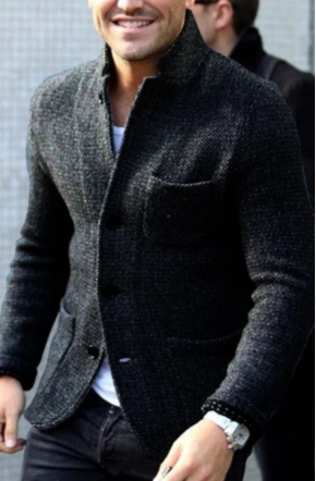 Close-up of a men's button-down casual jacket, highlighting fabric texture & button details. Ideal for fall/spring.