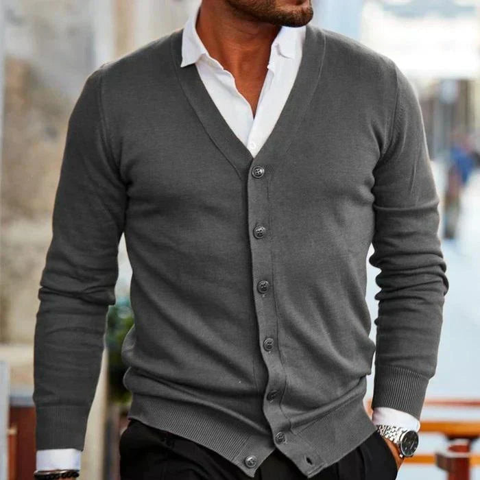 Elegant men's button-down v-neck knit cardigan. A versatile long sleeve sweater for casual or smart casual menswear.