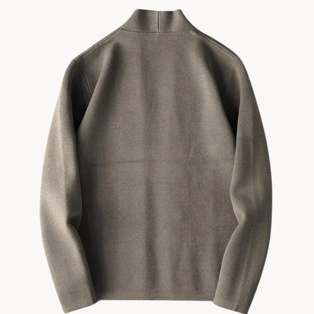 Close-up of a men's versatile knitwear cardigan, showing button-up detail and comfortable texture.